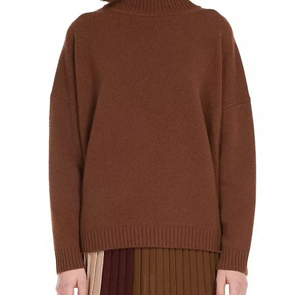 Feel the luxury! Weekend Max Mara

Borgia Wool Turtleneck Sweater - Picture 2 of 9